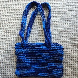 Blue crocheted shoulder bag